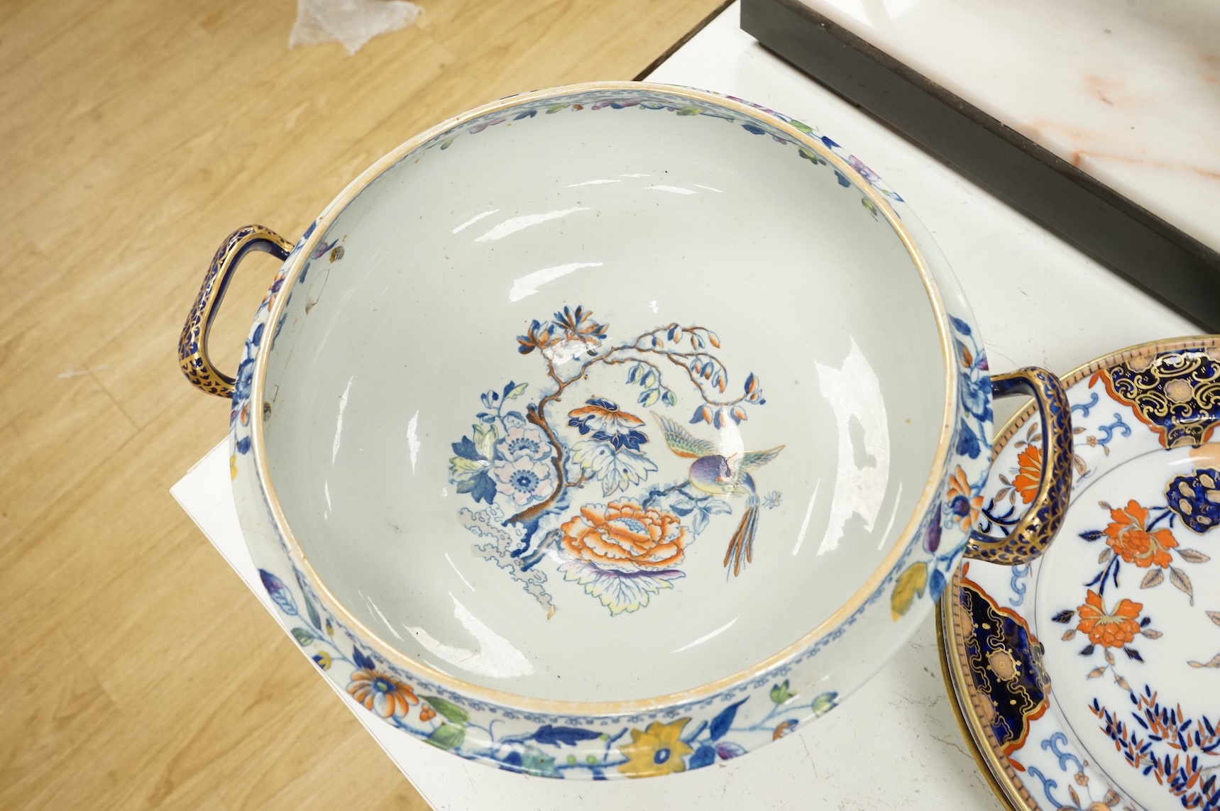 A Victorian Davenport dinner service to include tureens, dinner plates and soup bowls, largest 52cm wide